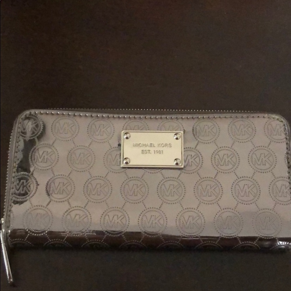 Authentic never used Michael kors silver wallet
